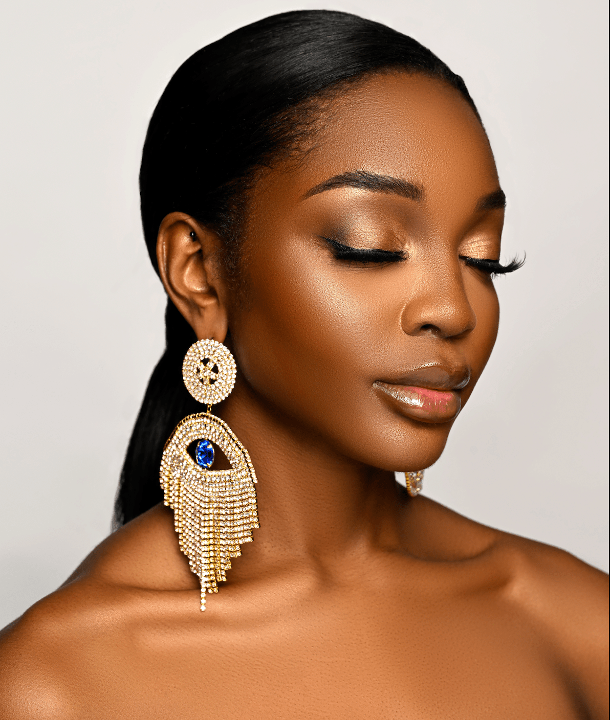 Gorgeous Asymmetrical Evil Eye Rhinestone Tassel Statement Stud Earrings - Fatisha Boutique