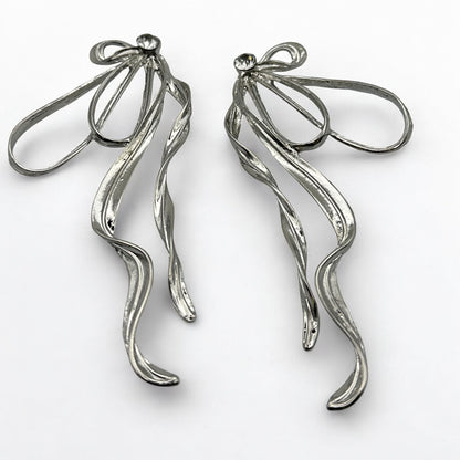 Silver Bow Rhinestone Statement Earrings – Elegant Sparkling Glam