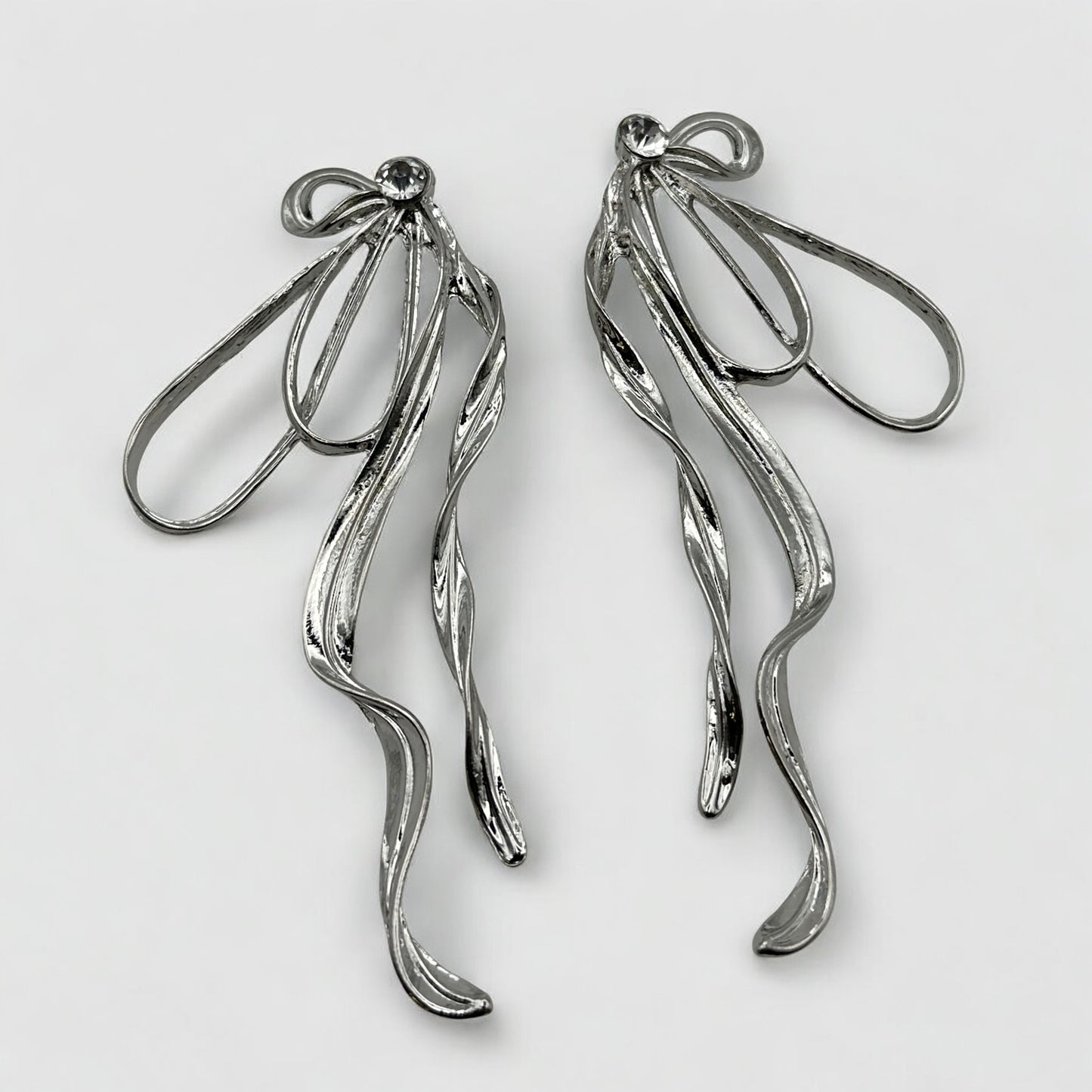 Silver Bow Rhinestone Statement Earrings – Elegant Sparkling Glam