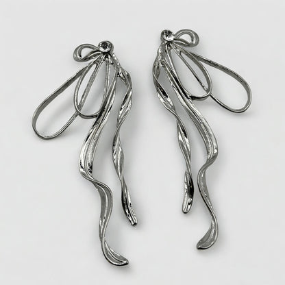 Silver Bow Rhinestone Statement Earrings – Elegant Sparkling Glam