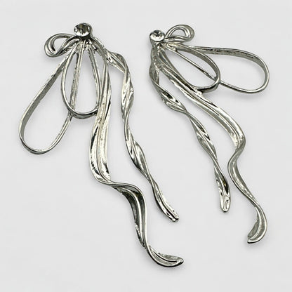 Silver Bow Rhinestone Statement Earrings – Elegant Sparkling Glam