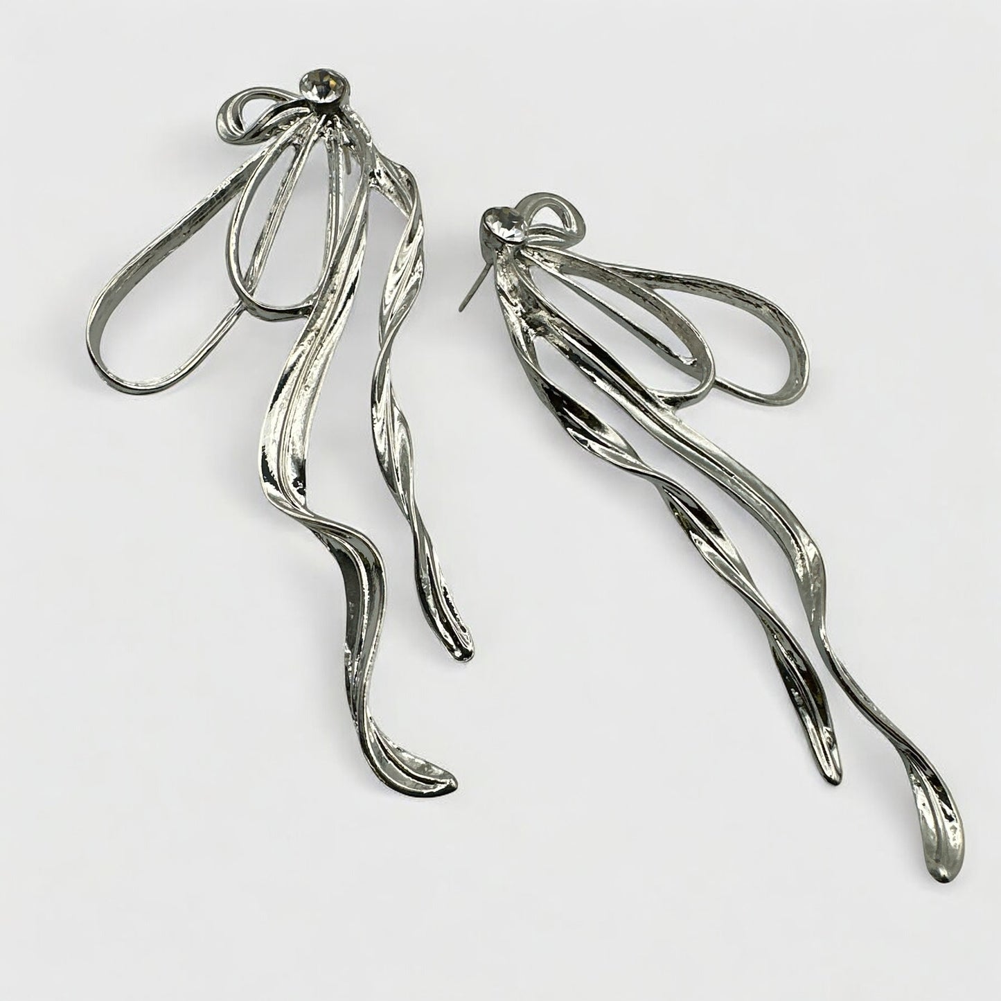 Silver Bow Rhinestone Statement Earrings – Elegant Sparkling Glam