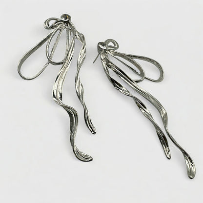 Silver Bow Rhinestone Statement Earrings – Elegant Sparkling Glam