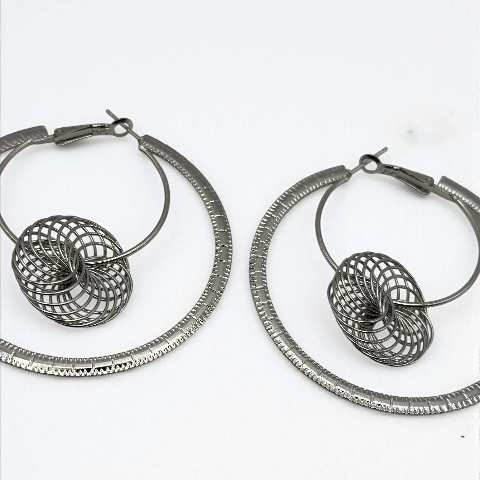 Modern Spiral Geometric Hoop Earrings – Gold & Silver Statement Design - Fatisha Boutique #