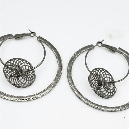 Modern Spiral Geometric Hoop Earrings – Gold & Silver Statement Design - Fatisha Boutique #