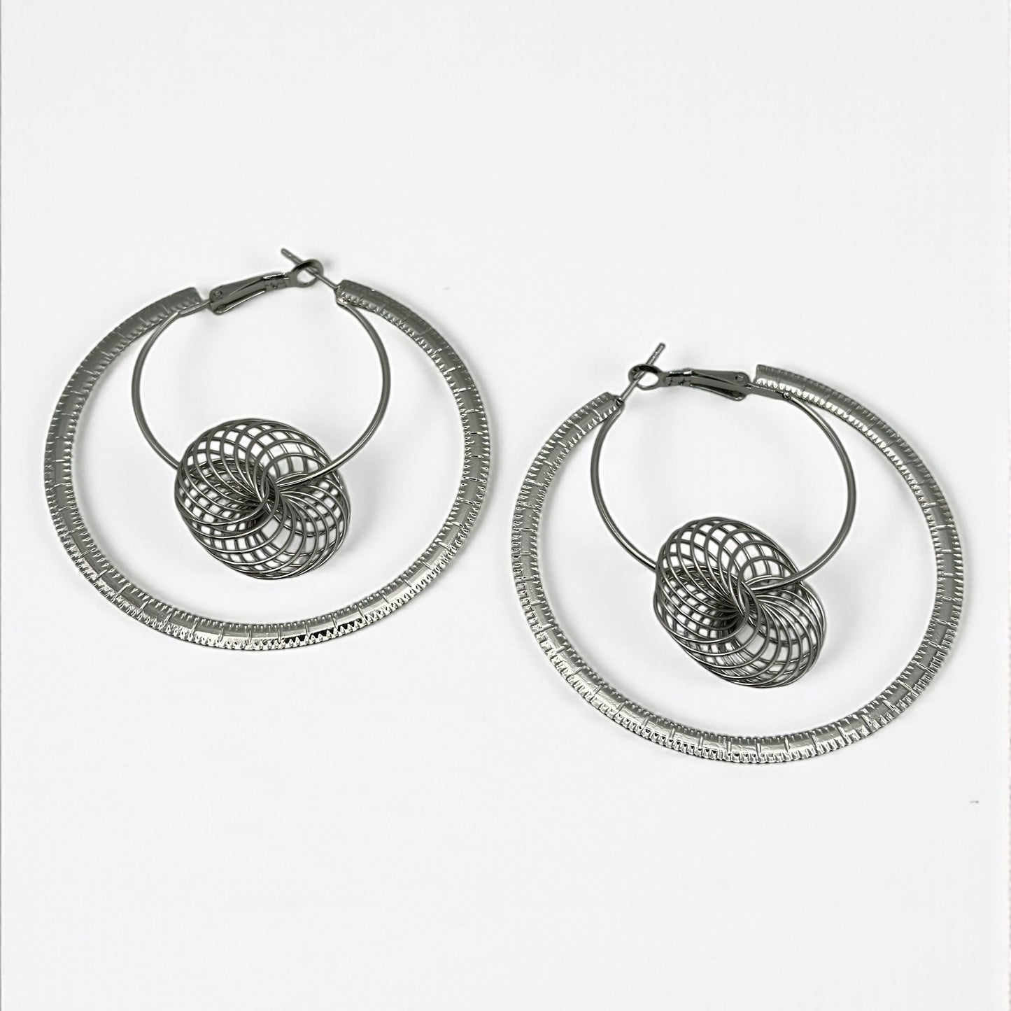 Modern Spiral Geometric Hoop Earrings – Gold & Silver Statement Design - Fatisha Boutique #