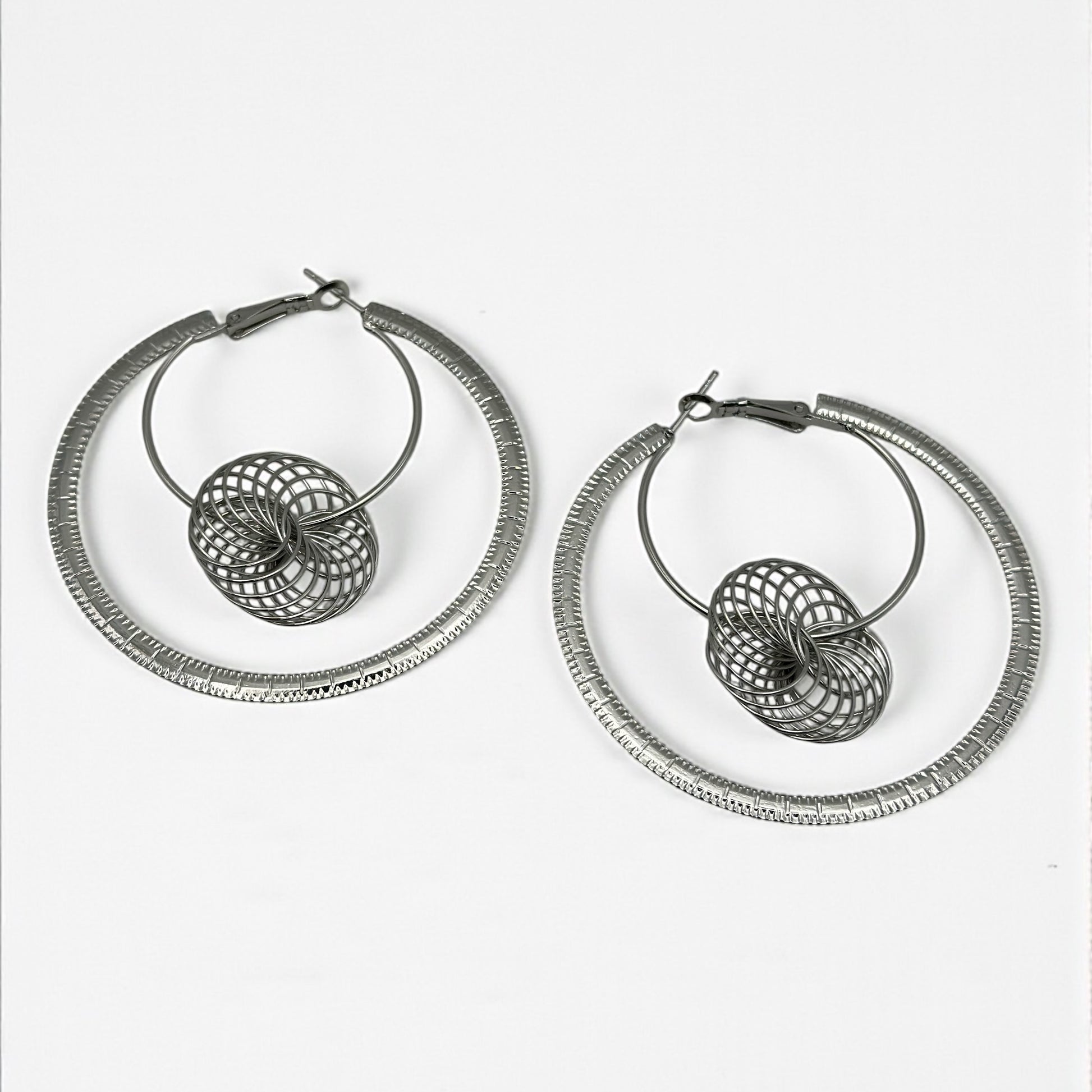 Modern Spiral Geometric Hoop Earrings – Gold & Silver Statement Design - Fatisha Boutique #