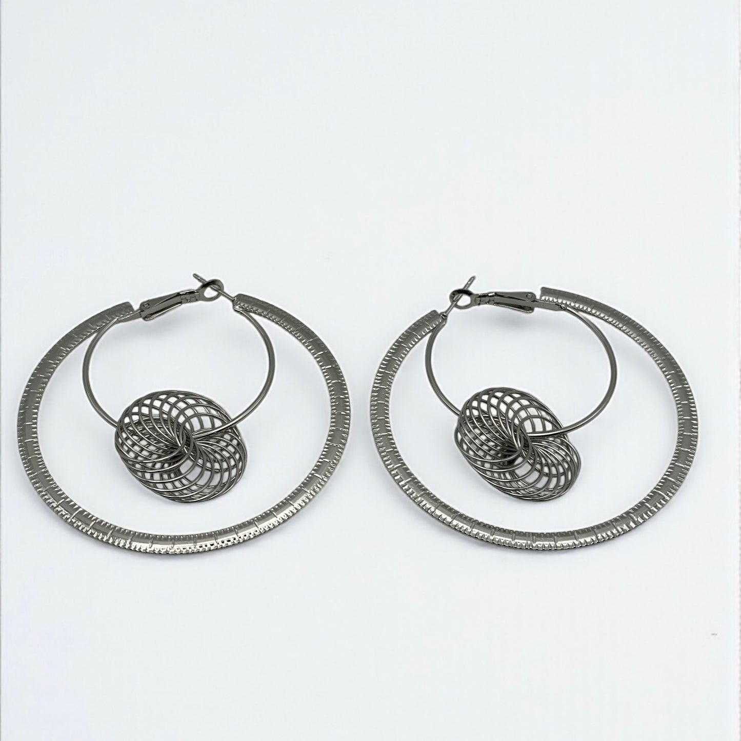 Modern Spiral Geometric Hoop Earrings – Gold & Silver Statement Design - Fatisha Boutique #