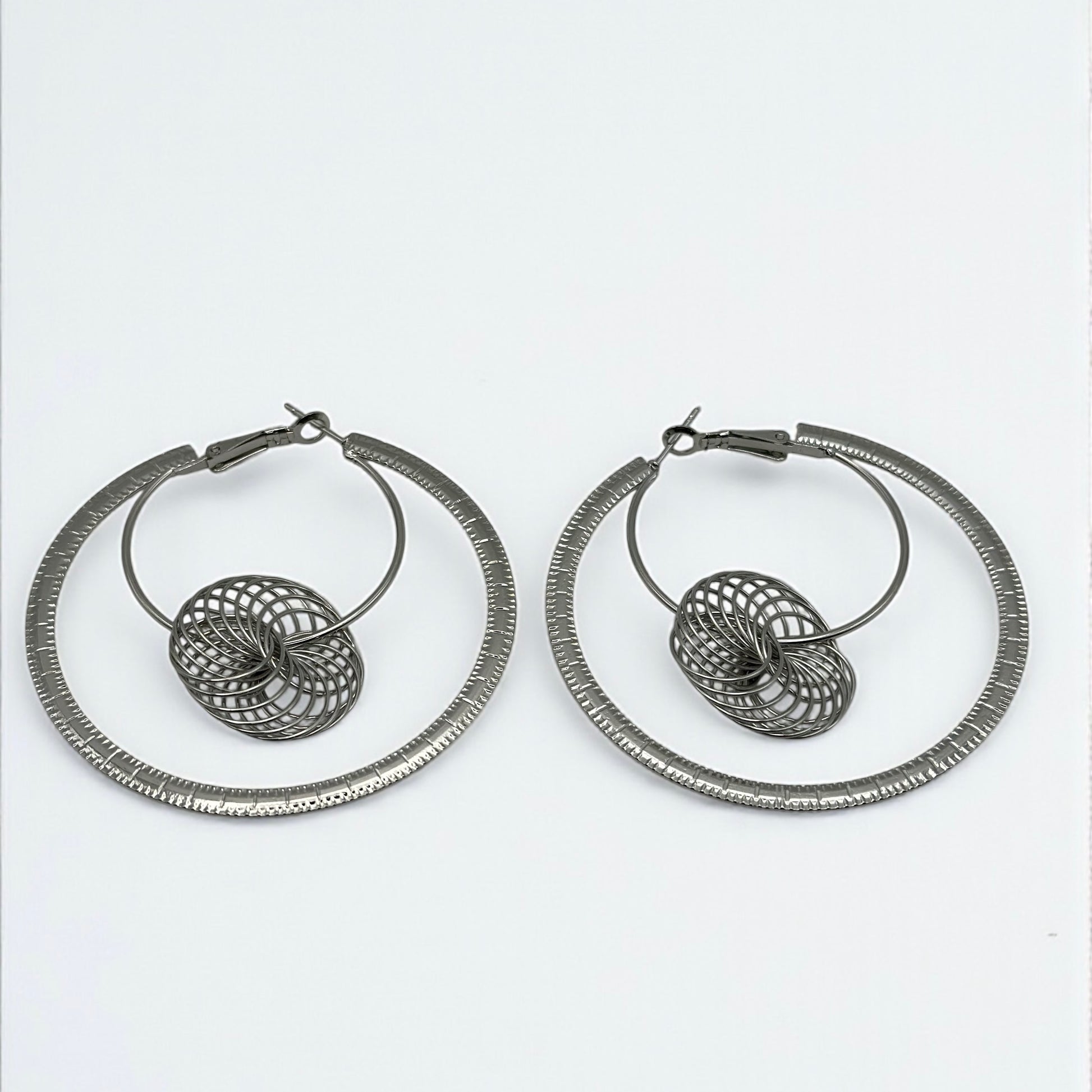 Modern Spiral Geometric Hoop Earrings – Gold & Silver Statement Design - Fatisha Boutique #
