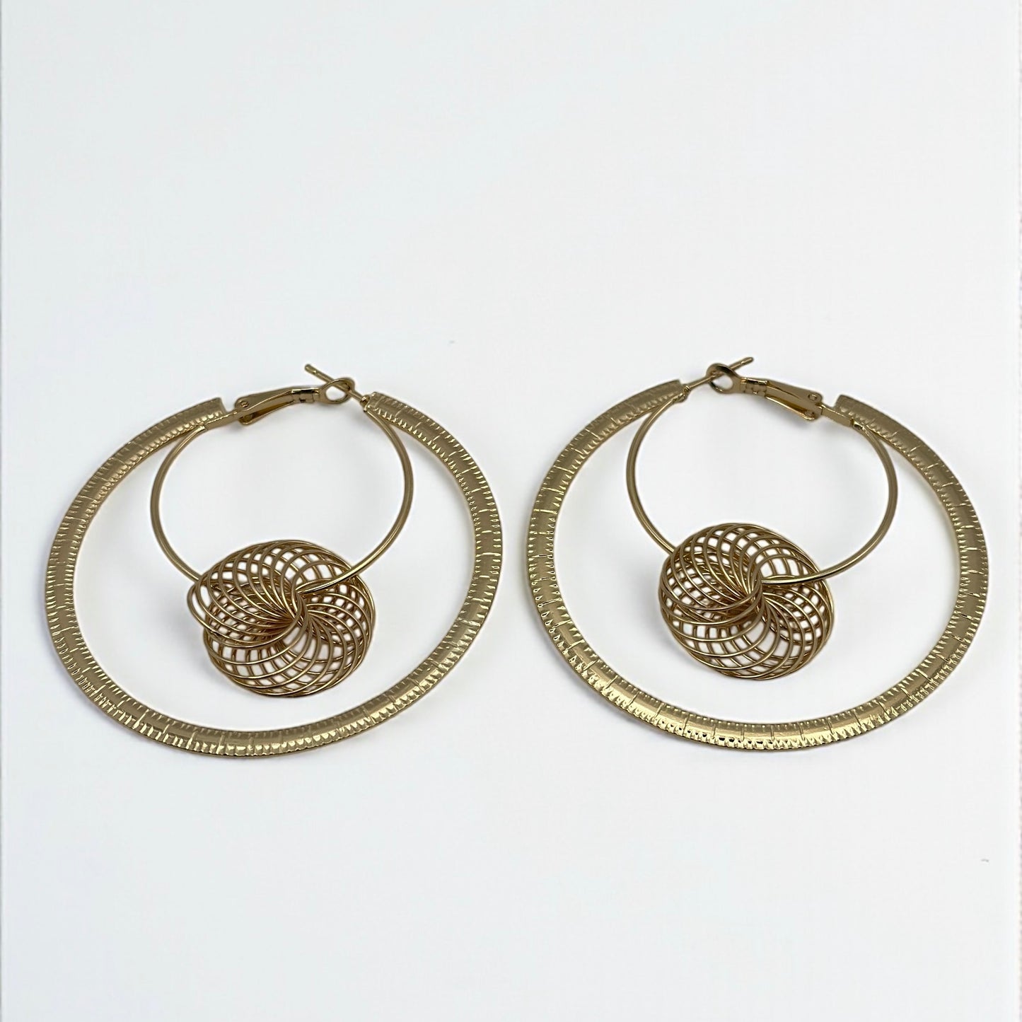 Modern Spiral Geometric Hoop Earrings – Gold & Silver Statement Design - Fatisha Boutique #