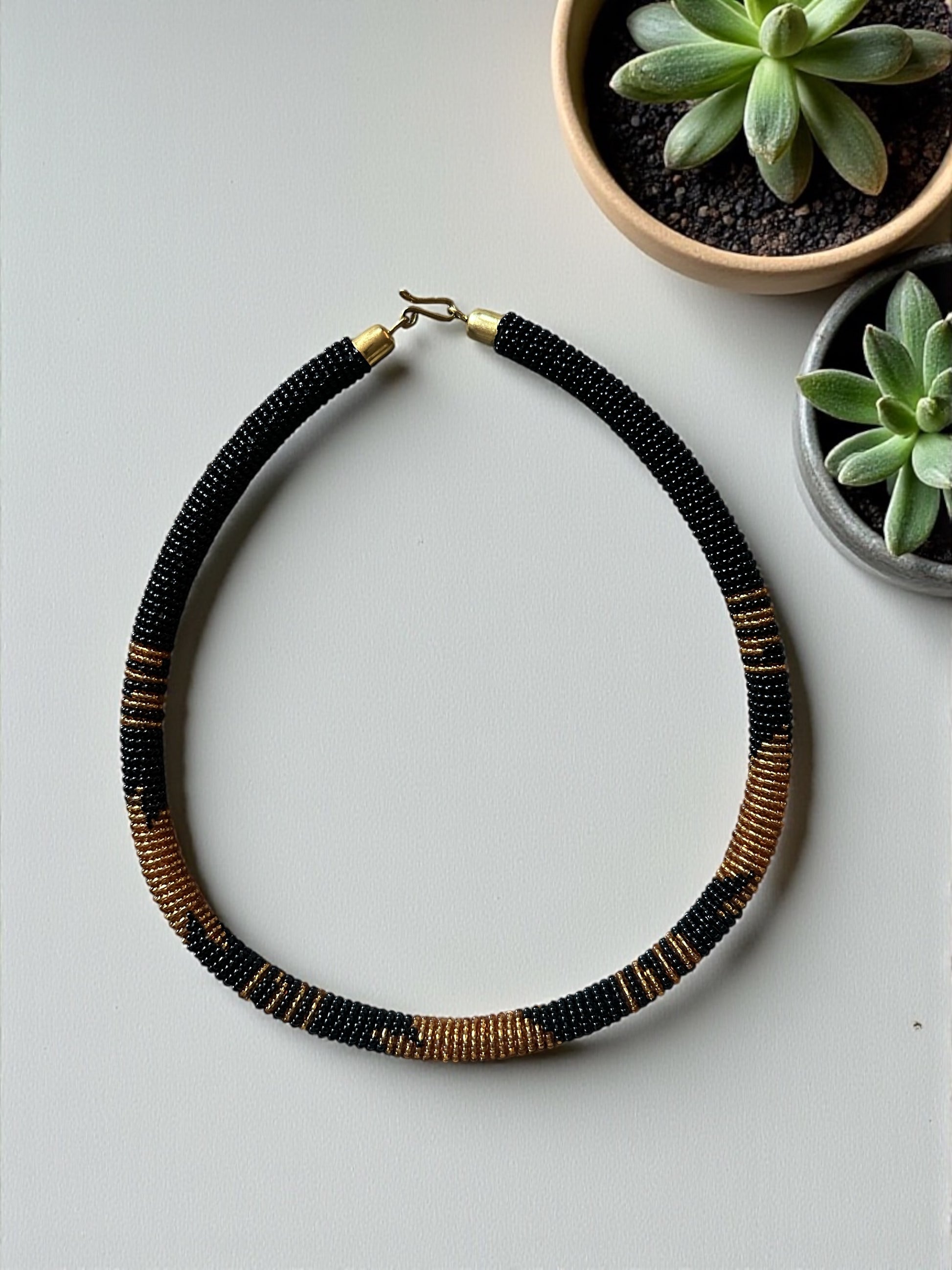 Handmade African Zulu Necklace – Black & Gold Beaded Tribal Jewellery - Fatisha Boutique #