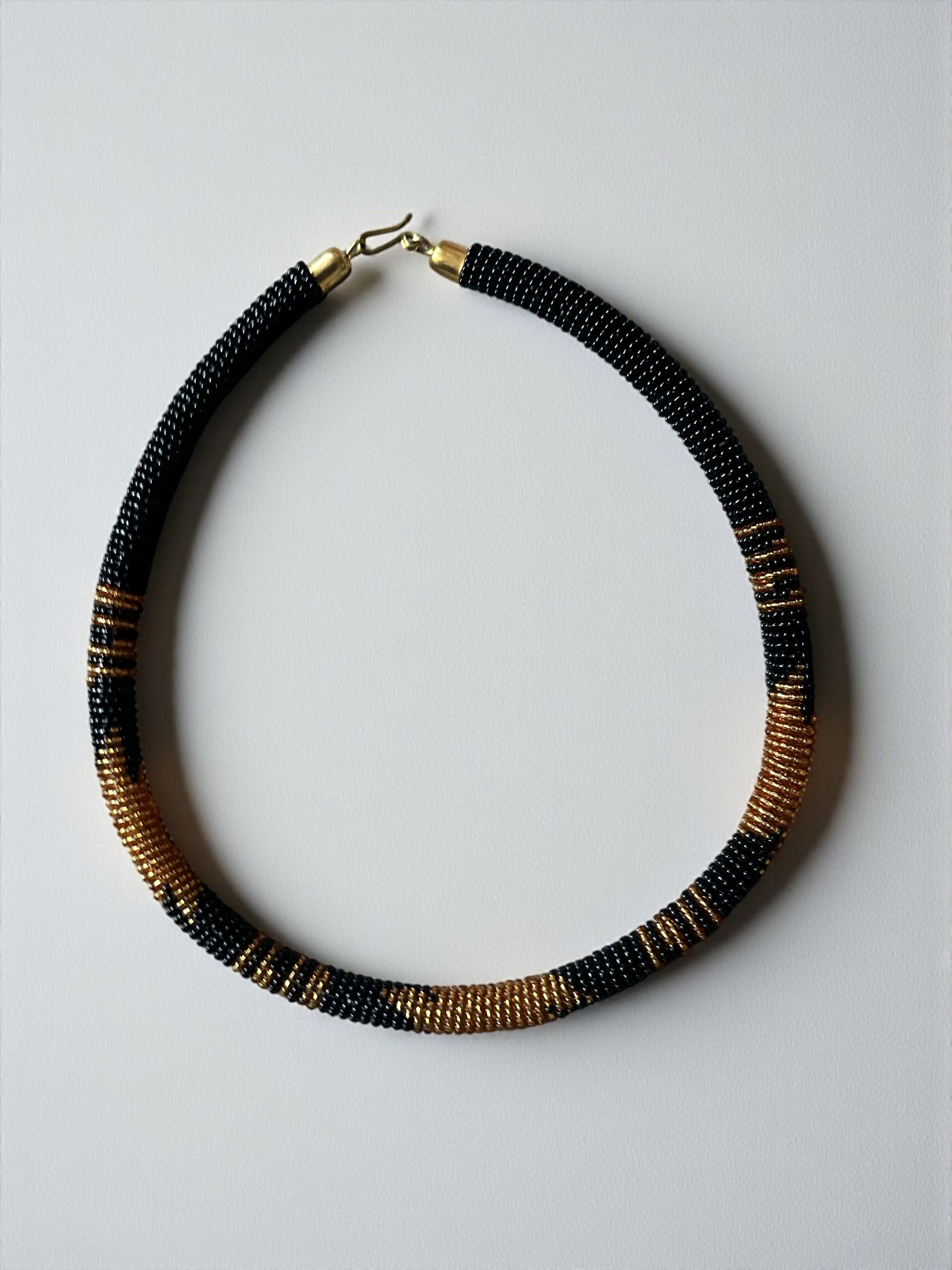 Handmade African Zulu Necklace – Black & Gold Beaded Tribal Jewellery - Fatisha Boutique #
