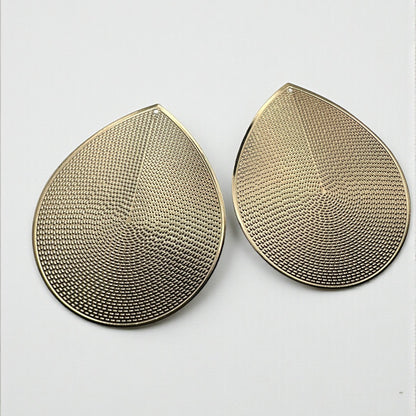 Oversized Gold Teardrop Statement Earrings – Textured African-Inspired Metal Drops - Fatisha Boutique #