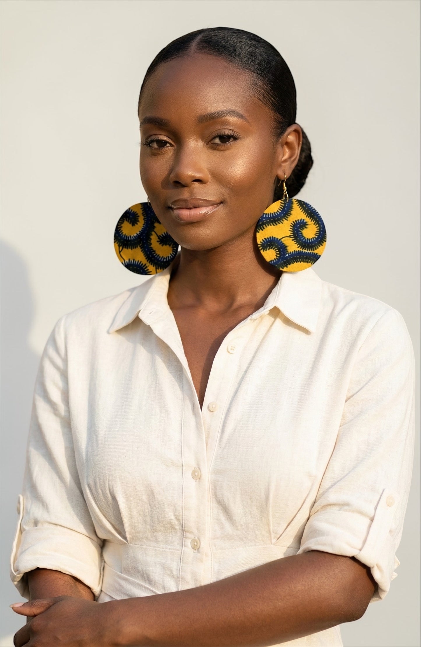 Yellow & Navy Ankara Fabric Statement Earrings – Handmade African Print Round Dangle JewelleryYellow & Blue Spiral Ankara Earrings | Handmade African Round Statement Jewellery | Lightweight - Fatisha Boutique #