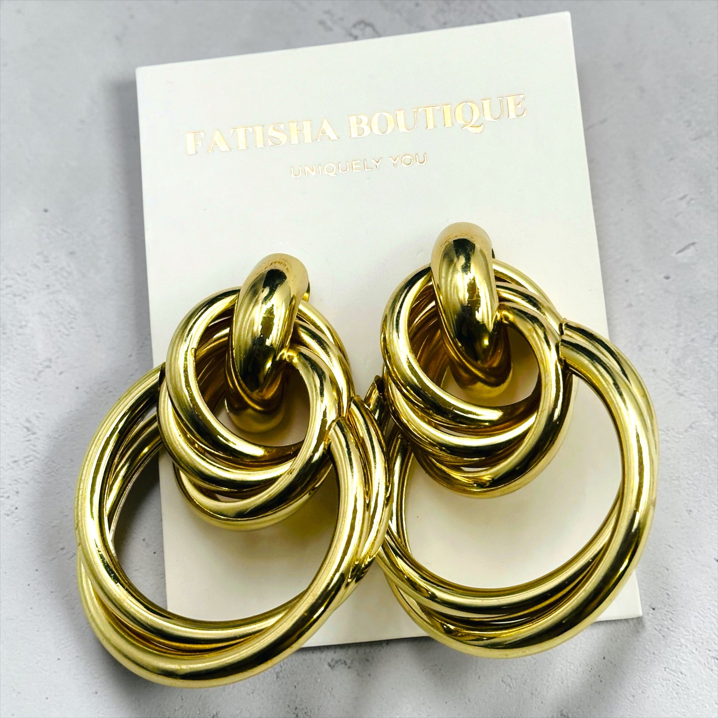 Luxury Interlocking Hoop Statement Earrings – Gold & Silver Stainless Steel Drop Earrings - Fatisha Boutique # Fatisha Boutique