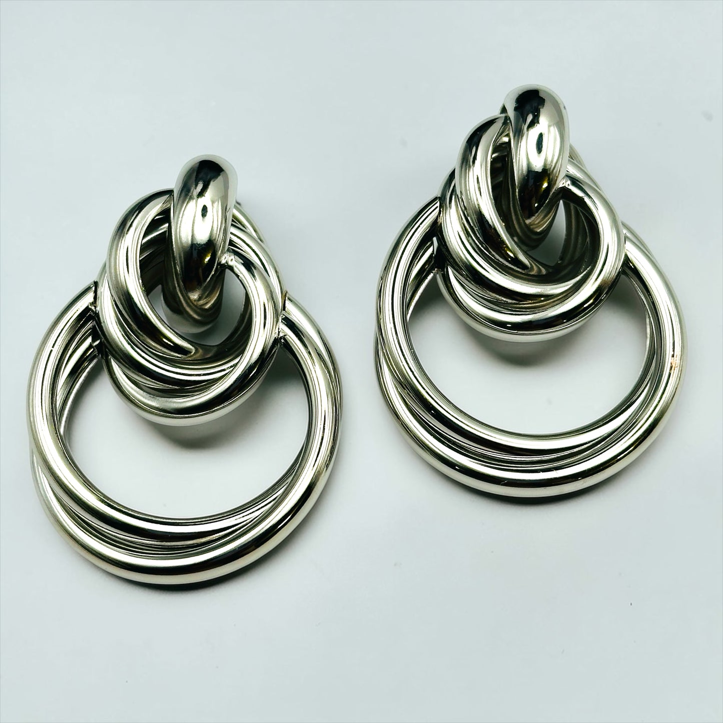 Luxury Interlocking Hoop Statement Earrings – Gold & Silver Stainless Steel Drop Earrings - Fatisha Boutique # Fatisha Boutique