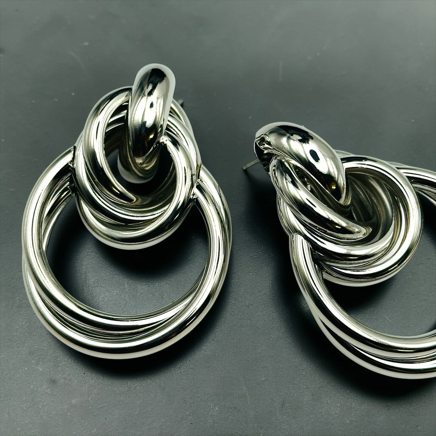 Luxury Interlocking Hoop Statement Earrings – Gold & Silver Stainless Steel Drop Earrings - Fatisha Boutique # Fatisha Boutique