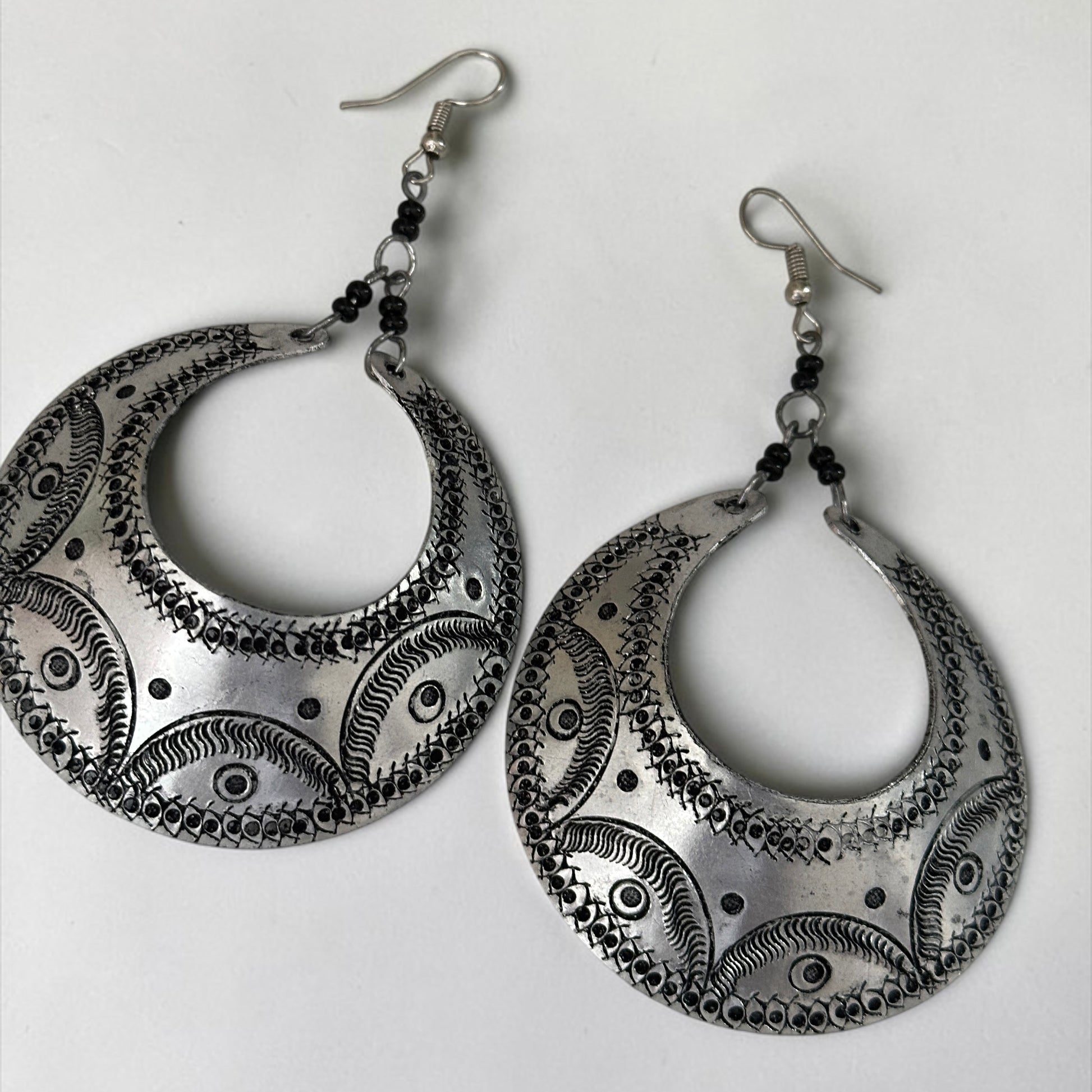 Engraved Silver Crescent Dangle Earrings – Handmade Afrocentric Aluminium Jewellery - Fatisha Boutique