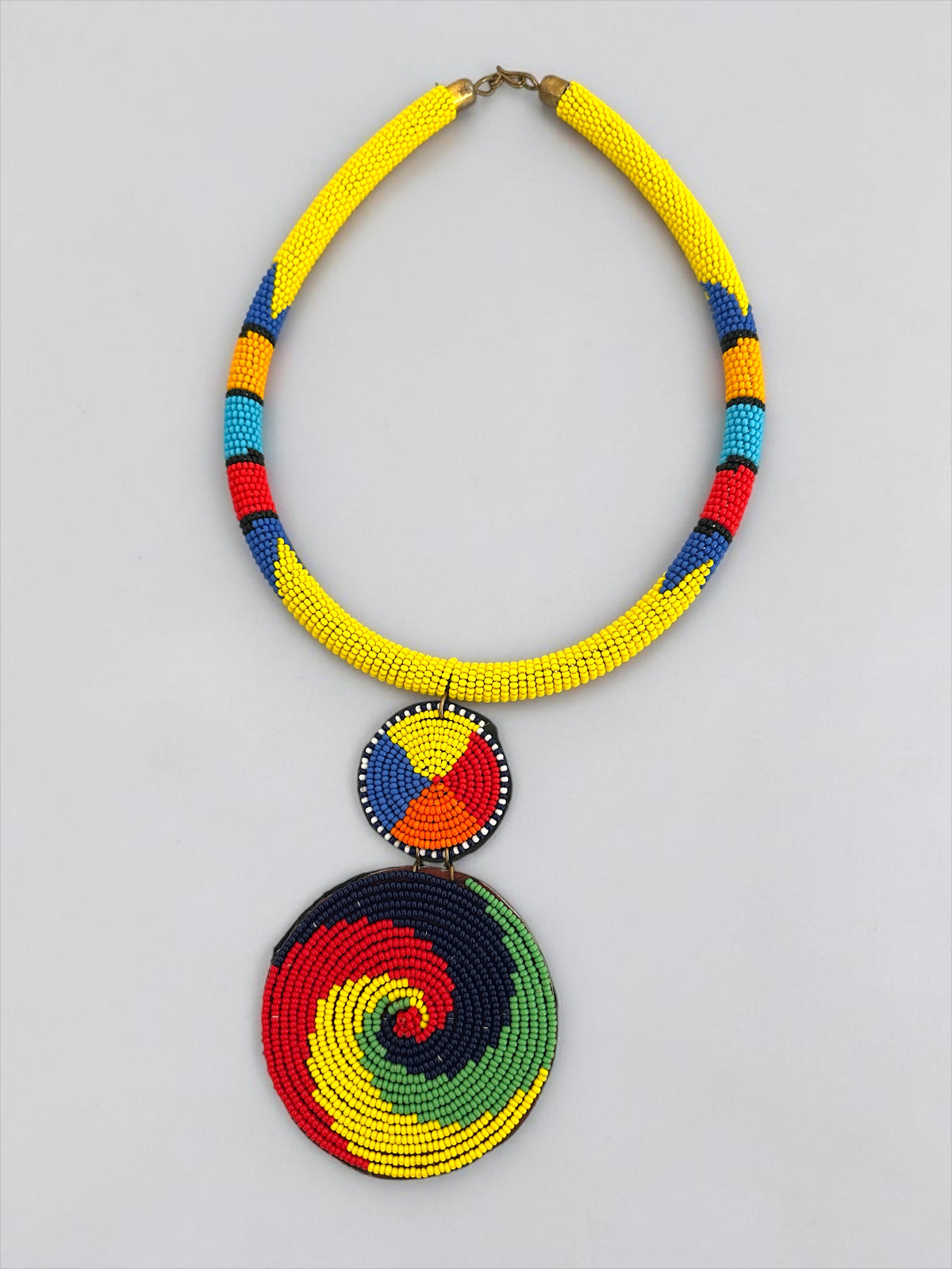 Maasai Beaded Spiral Pendant Necklace – Handmade Afrocentric Statement - Fatisha Boutique Fatisha Boutique