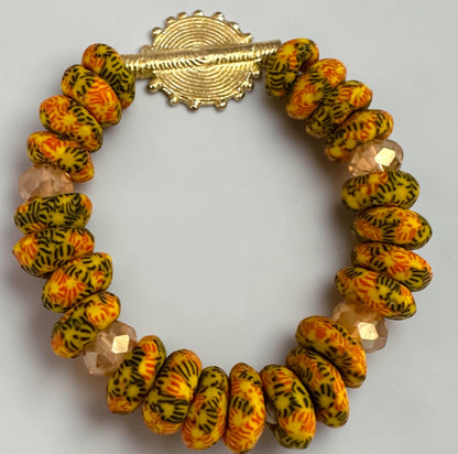 Krobo Bead Stretch Bracelet – Ghana Glass with Brass Sun Charm - Fatisha Boutique