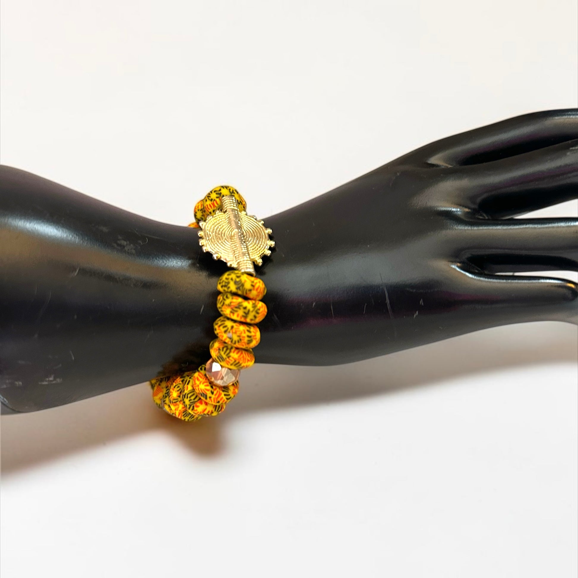 Krobo Bead Stretch Bracelet – Ghana Glass with Brass Sun Charm - Fatisha Boutique