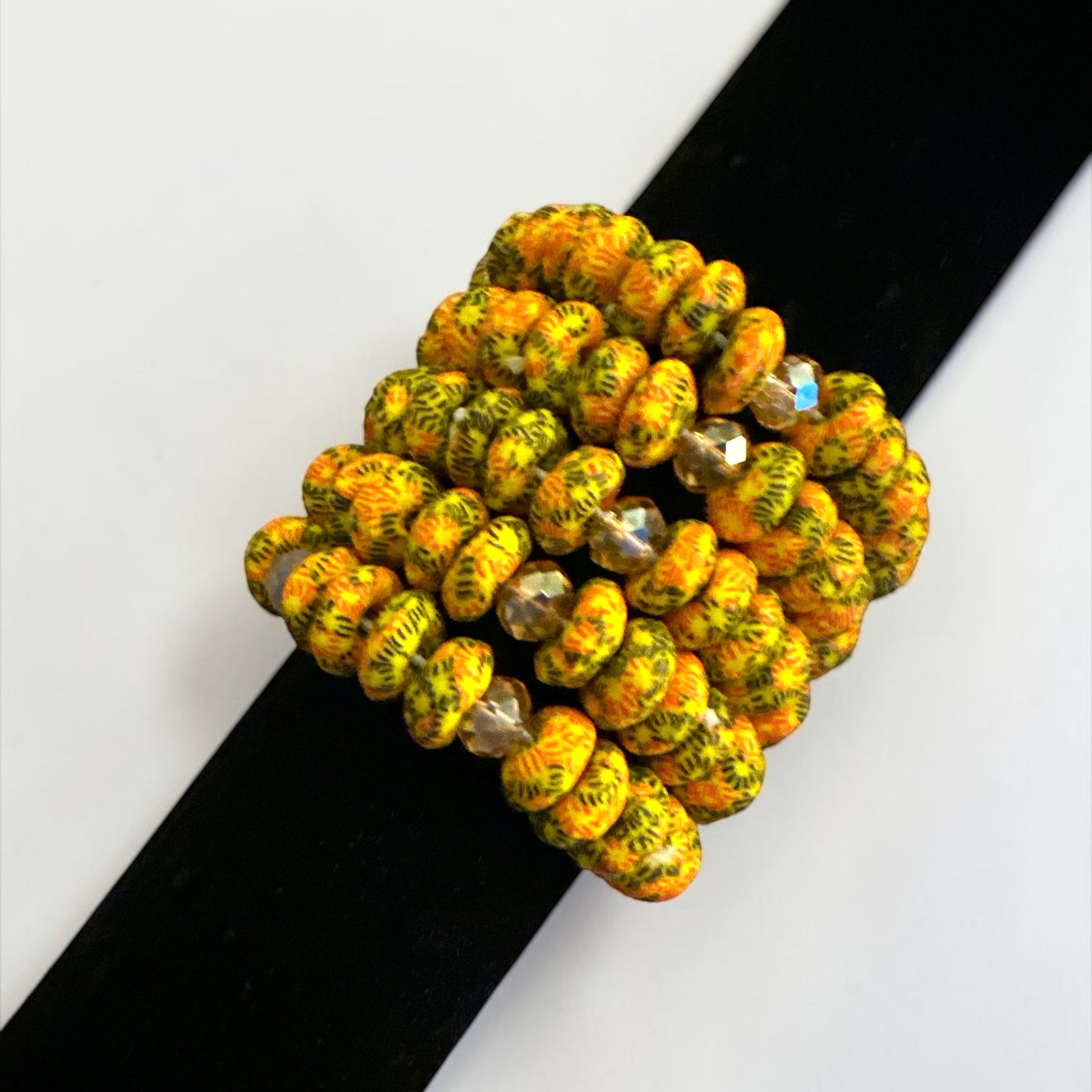 Krobo Bead Stretch Bracelet – Ghana Glass with Brass Sun Charm - Fatisha Boutique