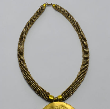 African Handmade Blue Tassel Statement Necklace – Brass Medallion Fringe - Fatisha Boutique