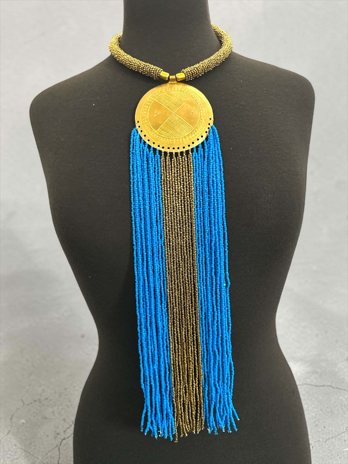 African Handmade Blue Tassel Statement Necklace – Brass Medallion Fringe - Fatisha Boutique Fatisha Boutique
