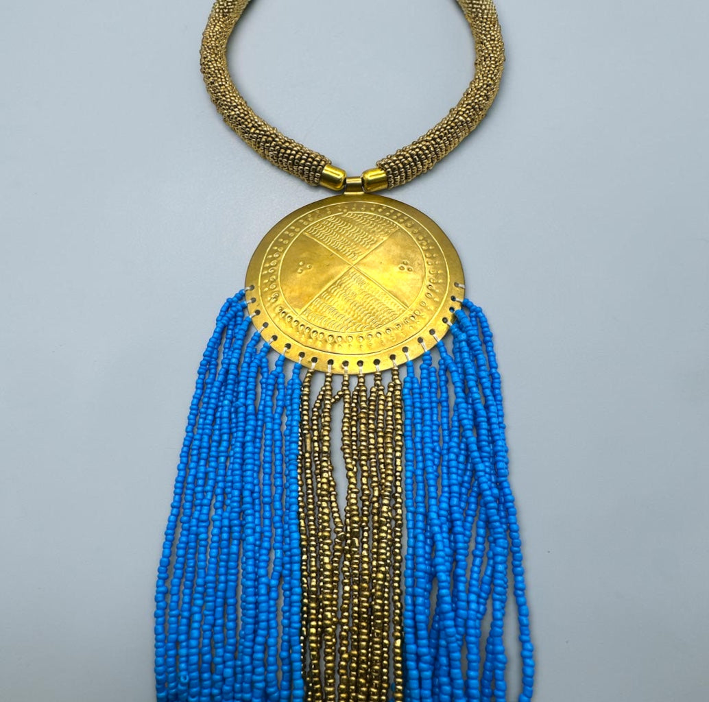 African Handmade Blue Tassel Statement Necklace – Brass Medallion Fringe - Fatisha Boutique Fatisha Boutique