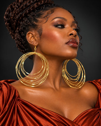 Boucles d'oreilles pendantes africaines surdimensionnées faites main en laiton doré à plusieurs anneaux