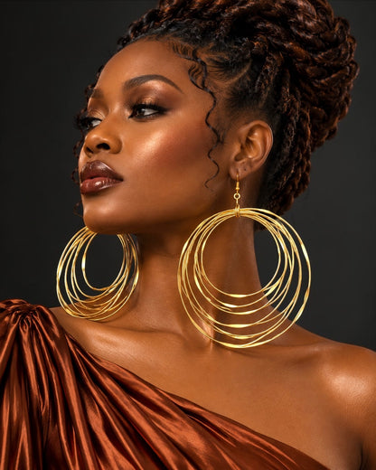 Boucles d'oreilles pendantes africaines surdimensionnées faites main en laiton doré à plusieurs anneaux