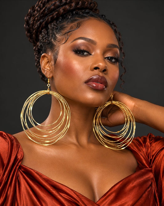 Boucles d'oreilles pendantes africaines surdimensionnées faites main en laiton doré à plusieurs anneaux