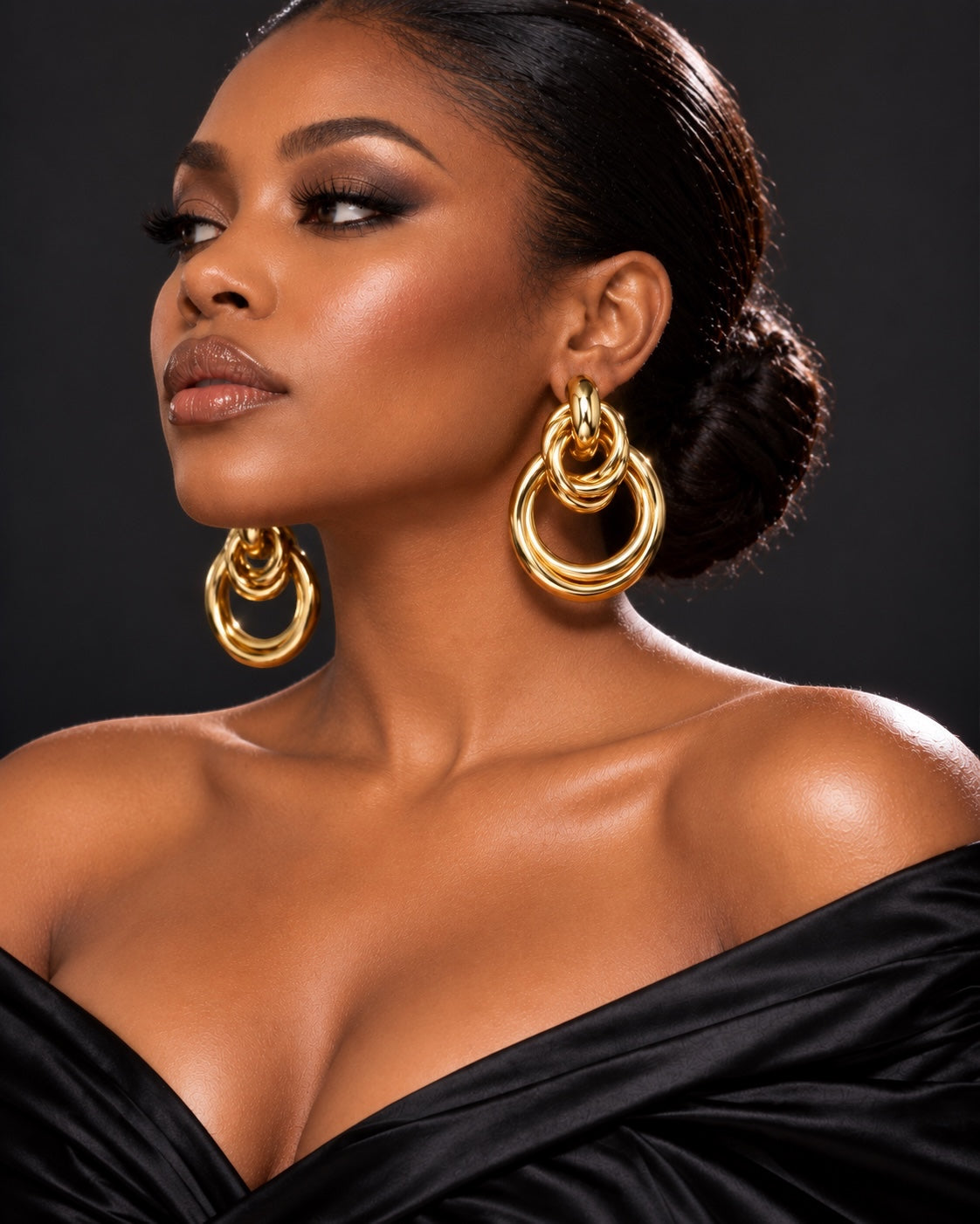 Gold and silver stainless steel interlocking ring statement drop earrings Fatisha Boutique