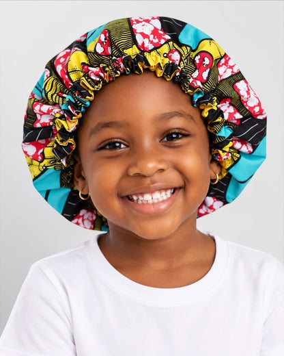 Kids adjustable double-layer Ankara print bonnet with satin lining for ages 1 to 5 years