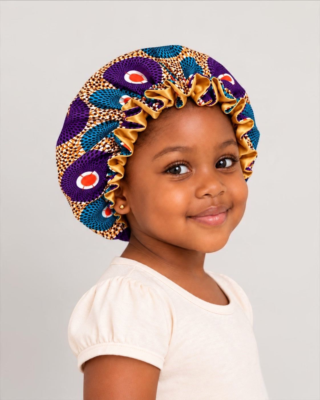 Kids Reversible Ankara Satin Silk Ruffle Bonnet – Ages 1–5 - Fatisha Boutique Fatisha Boutique