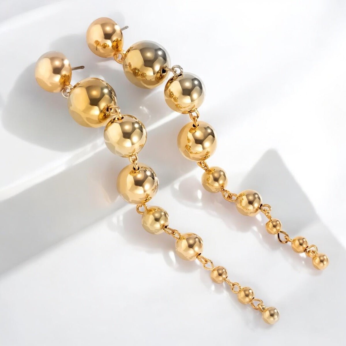 Minimalist Long Drop Ball Earrings – Elegant Statement Jewellery in Gold and Silver - Fatisha Boutique