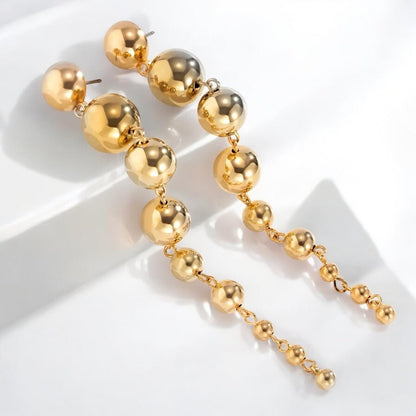 Minimalist Long Drop Ball Earrings – Elegant Statement Jewellery in Gold and Silver - Fatisha Boutique