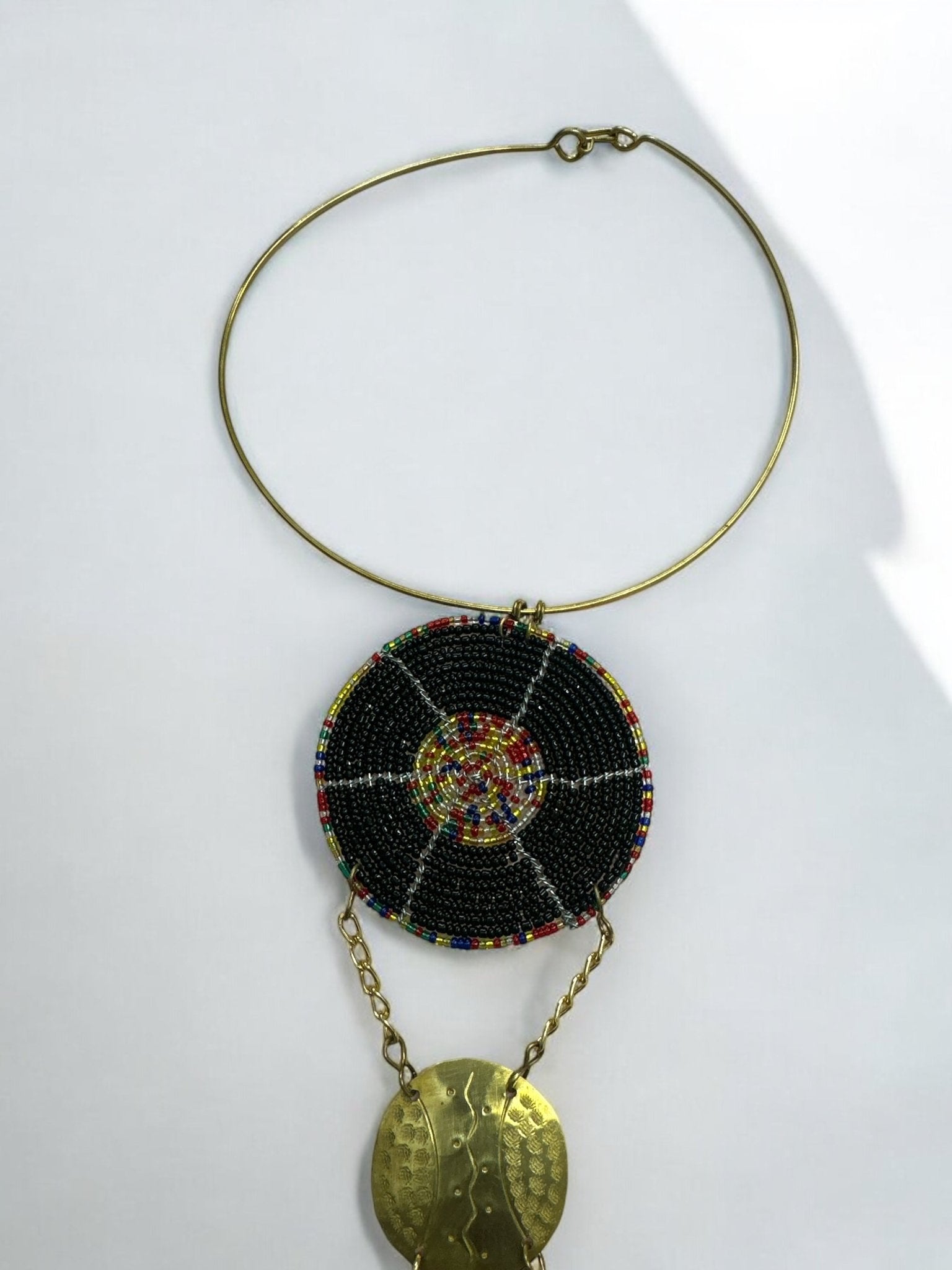 Unique Handcrafted African Black Beaded Necklace with Brass Medallions - Fatisha Boutique