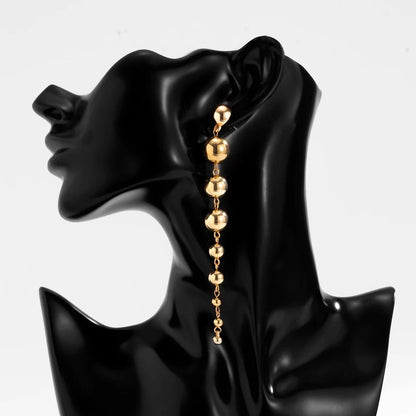 Minimalist Long Drop Ball Earrings – Elegant Statement Jewellery in Gold and Silver - Fatisha Boutique